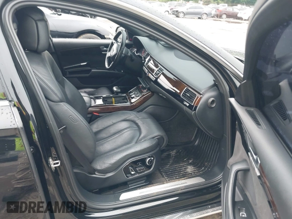 2015 Audi A8 4.0T с VIN WAU32AFD8FN019377, выставлен на аукционе IAAI как лот 42501787 с пробегом 116 355 миль миль и . История ставок и продаж доступна на DreamBid. Изображение 5.