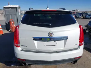 2015 Cadillac SRX with VIN 3GYFNAE34FS557297, listed as a IAAI auction lot 41388573 with 124,185 mi miles and . Bid and sale history available at DreamBid. Image 16.