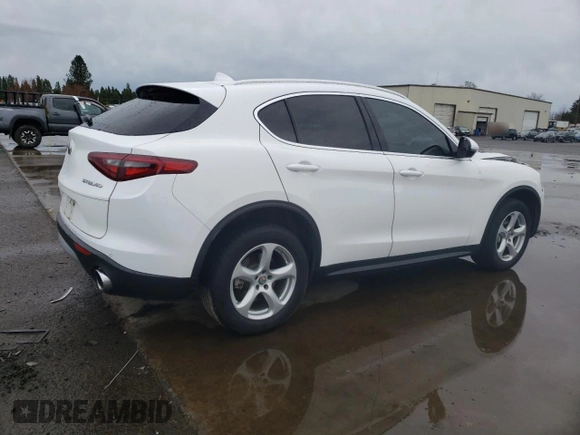 2018 Alfa Romeo Stelvio z VIN ZASFAKAN9J7B88322, wystawiony jako Copart lot #48808605 z przebiegiem 87 096 mil mil oraz Szkody całkowita. Historia ofert i sprzedaży dostępna na DreamBid. Obrazek 3.