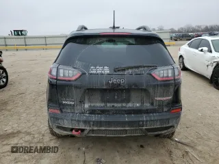 2020 Jeep Cherokee Trailhawk z VIN 1C4PJMBN6LD518073, wystawiony jako Copart lot #43611095 z przebiegiem 39 947 mil mil oraz Szkoda całkowita • Salvage title. Historia ofert i sprzedaży dostępna na DreamBid. Obrazek 6.