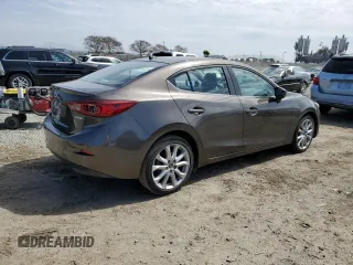 2015 Mazda 3 S Touring with VIN JM1BM1V3XF1219587, listed as a Copart auction lot 49491275 with 87,880 mi miles and Salvage Title. Bid and sale history available at DreamBid. Image 3.