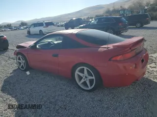 1999 Mitsubishi Eclipse RS with VIN 4A3AK34Y0XE143864, listed as a Copart auction lot 83334494 with 275,714 mi miles and Salvage Title. Bid and sale history available at carsss.com. Image 2.