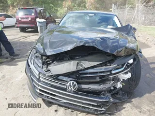 2021 Volkswagen Arteon SE z VIN WVWAR7AN5ME012022, wystawiony jako IAAI lot #41964379 z przebiegiem 30 771 mil mil oraz . Historia ofert i sprzedaży dostępna na DreamBid. Obrazek 6.