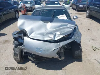 2013 Mazda MX-5 Miata Sport z VIN JM1NC2JF8D0232377, wystawiony jako IAAI lot #42312848 z przebiegiem Nie podano mil oraz . Historia ofert i sprzedaży dostępna na DreamBid. Obrazek 13.