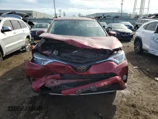 2018 Toyota RAV4 XLE with VIN 2T3RFREV0JW725903, listed as a Copart auction lot 48519955 with 55,056 mi miles and Salvage Title. Bid and sale history available at DreamBid. Image 5.
