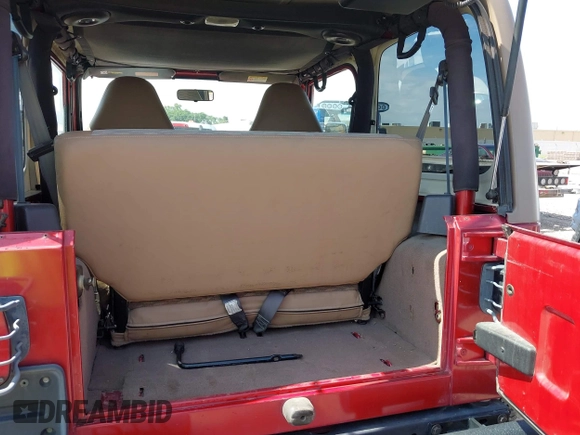 1999 Jeep Wrangler Sport with VIN 1J4FY19S2XP423638, listed as a IAAI auction lot 42553626 with 120,690 mi miles and . Bid and sale history available at DreamBid. Image 16.