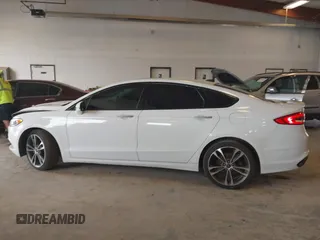 2017 Ford Fusion Titanium with VIN 3FA6P0D9XHR136815, listed as a IAAI auction lot 42596651 with 109,608 mi miles and . Bid and sale history available at DreamBid. Image 14.