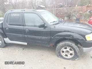 2003 Ford Explorer Sport Trac XLS z VIN 1FMZU77E13UC70160, wystawiony jako IAAI lot #41969542 z przebiegiem 217 628 mil mil oraz . Historia ofert i sprzedaży dostępna na DreamBid. Obrazek 6.