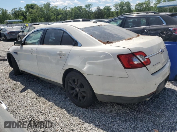 2011 Ford Taurus SEL with VIN 1FAHP2EW0BG160421, listed as a Copart auction lot 56014075 with 212,421 mi miles and Clean Title. Bid and sale history available at DreamBid. Image 2.