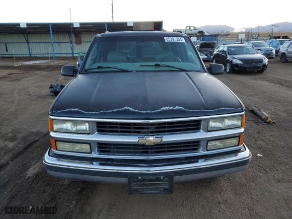 1999 Chevrolet Tahoe with VIN 1GNEC13R4XJ568244, listed as a Copart auction lot 85397504 with 111,327 mi miles and Clean Title. Bid and sale history available at carsss.com. Image 5.