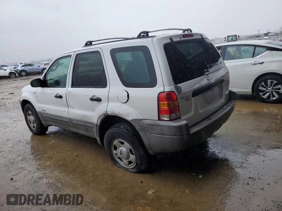 2001 Ford Escape XLS with VIN 1FMYU01191KA29996, listed as a Copart auction lot 86362534 with 265,271 mi miles and Salvage title. Bid and sale history available at DreamBid. Image 2.