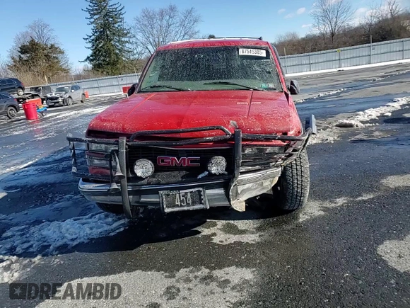 1997 GMC Suburban z VIN 3GKGK26J9VG515459, wystawiony jako Copart lot #87515385 z przebiegiem 205 982 mil mil oraz Szkoda całkowita • Salvage title. Historia ofert i sprzedaży dostępna na DreamBid. Obrazek 11.