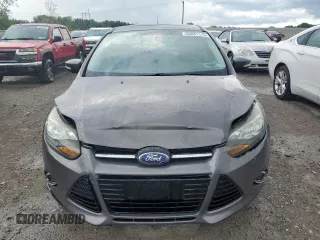 2014 Ford Focus Titanium with VIN 1FADP3N20EL329415, listed as a Copart auction lot 60881115 with 97,382 mi miles and Salvage title. Bid and sale history available at DreamBid. Image 5.