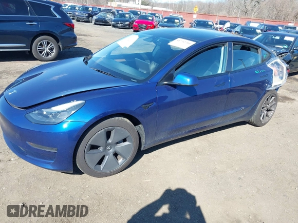 2023 Tesla Model 3 with VIN 5YJ3E1EA2PF690335, listed as a IAAI auction lot 41732701 with 22,238 mi miles and . Bid and sale history available at DreamBid. Image 2.