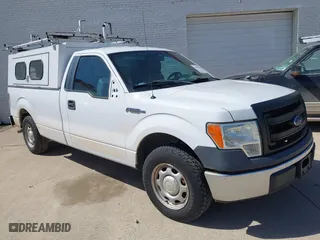 2014 Ford F-150 XL with VIN 1FTMF1CM4EKG22844, listed as a IAAI auction lot 41669259 with 242,141 mi miles. Bid and sale history available at carsss.com. Image 1.