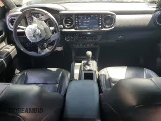 2020 Toyota Tacoma SR5 z VIN 3TMDZ5BN0LM094976, wystawiony jako Copart lot #58695515 z przebiegiem 84 025 mil mil oraz Czysty tytuł • Clean title. Historia ofert i sprzedaży dostępna na DreamBid. Obrazek 8.