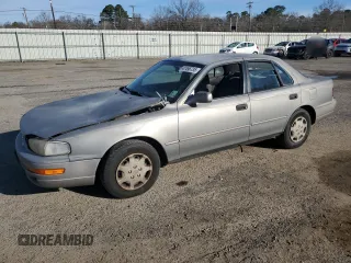1992 Toyota Camry LE with VIN 4T1SK12E3NU104088, listed as a Copart auction lot 47496735 with 174,957 mi miles and Salvage Title. Bid and sale history available at carsss.com. Image 1.
