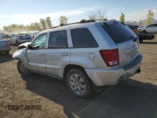 2009 Jeep Grand Cherokee Laredo with VIN 1J8HR48P39C559192, listed as a Copart auction lot 74007094 with 105,997 mi miles and Salvage Title. Bid and sale history available at carsss.com. Image 2.