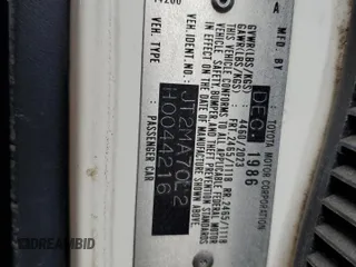 1987 Toyota Supra z VIN JT2MA70L2H0044216, wystawiony jako Copart lot #78864694 z przebiegiem 143 418 mil mil oraz Czysty tytuł • Clean title. Historia ofert i sprzedaży dostępna na DreamBid. Obrazek 12.