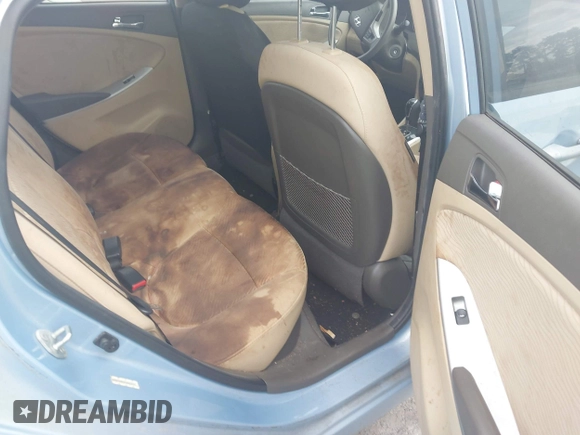 2013 Hyundai Accent GLS with VIN KMHCU4AE8DU583303, listed as a IAAI auction lot 42504235 with 113,992 mi miles and . Bid and sale history available at DreamBid. Image 8.