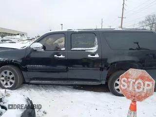 2010 Chevrolet Suburban LS with VIN 1GNUKHE37AR203811, listed as a IAAI auction lot 41304431 with Not provided miles and . Bid and sale history available at DreamBid. Image 13.