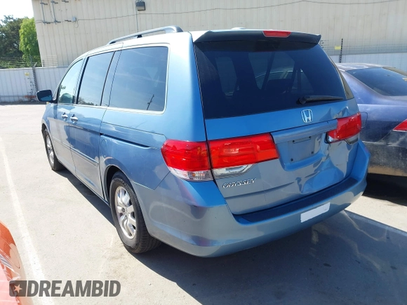 2010 Honda Odyssey EX-L with VIN 5FNRL3H64AB071603, listed as a IAAI auction lot 42084026 with 199,753 mi miles. Bid and sale history available at carsss.com. Image 3.