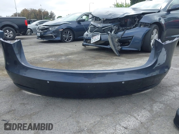 2018 Tesla Model 3 Long Range Battery with VIN 5YJ3E1EA8JF059385, listed as a IAAI auction lot 42116589 with 63,630 mi miles and . Bid and sale history available at DreamBid. Image 12.