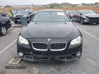2015 BMW 5 Series 535i with VIN WBA5B1C55FD922761, listed as a IAAI auction lot 42021799 with 118,592 mi miles and . Bid and sale history available at carsss.com. Image 12.