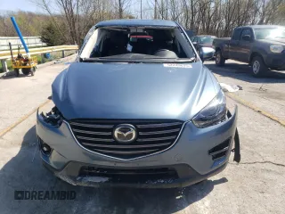 2016 Mazda CX-5 Grand Touring with VIN JM3KE2DY9G0724096, listed as a Copart auction lot 52249675 with 47,860 mi miles and Salvage Title. Bid and sale history available at carsss.com. Image 5.