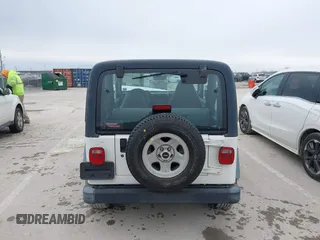 1998 Jeep Wrangler SE with VIN 1J4FY29P9WP793260, listed as a IAAI auction lot 41596990 with 90,766 mi miles. Bid and sale history available at carsss.com. Image 16.