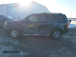 2009 Honda Pilot EX-L with VIN 5FNYF48649B026889, listed as a IAAI auction lot 41643289 with 121,511 mi miles and . Bid and sale history available at carsss.com. Image 14.