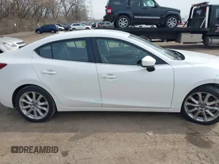 2014 Mazda 3 S Touring with VIN JM1BM1V3XE1187271, listed as a IAAI auction lot 41857386 with 168,104 mi miles and . Bid and sale history available at DreamBid. Image 13.