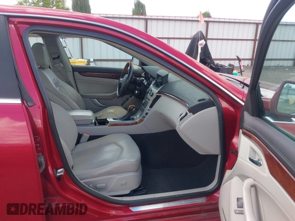 2012 Cadillac CTS Premium z VIN 1G6DS5E31C0104841, wystawiony jako IAAI lot #42292295 z przebiegiem 124 477 mil mil oraz . Historia ofert i sprzedaży dostępna na DreamBid. Obrazek 5.