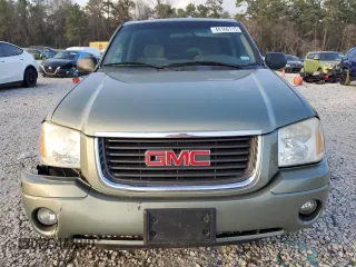 2003 GMC Envoy SLT with VIN 1GKDS13S832408371, listed as a Copart auction lot 44166715 with 208,256 mi miles and Salvage Title. Bid and sale history available at carsss.com. Image 5.