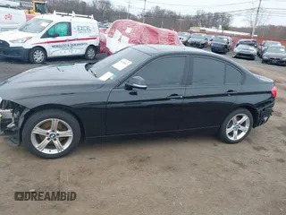 2014 BMW 3 Series 328i xDrive with VIN WBA3B5G52ENS10452, listed as a IAAI auction lot 41940823 with 177,830 mi miles. Bid and sale history available at carsss.com. Image 14.