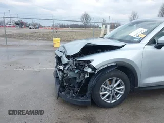 2023 Mazda CX-5 S Preferred with VIN JM3KFBCM1P0131070, listed as a IAAI auction lot 41661970 with 31,910 mi miles and . Bid and sale history available at carsss.com. Image 6.