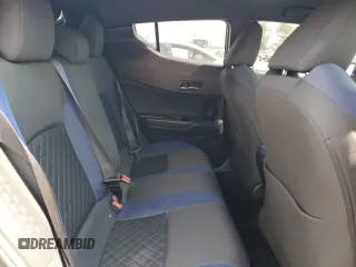 2022 Toyota C-HR XLE z VIN NMTKHMBX2NR140945, wystawiony jako Copart lot #58809375 z przebiegiem 56 161 mil mil oraz Nie do naprawy • Non repairable. Historia ofert i sprzedaży dostępna na DreamBid. Obrazek 11.