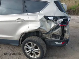 2018 Ford Escape SE z VIN 1FMCU9GD1JUB02119, wystawiony jako IAAI lot #42092393 z przebiegiem 69 309 mil mil oraz . Historia ofert i sprzedaży dostępna na DreamBid. Obrazek 17.