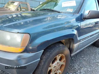 2001 Jeep Grand Cherokee Laredo with VIN 1J4GW48SX1C585867, listed as a IAAI auction lot 42793657 with 197,167 mi miles and . Bid and sale history available at DreamBid. Image 6.