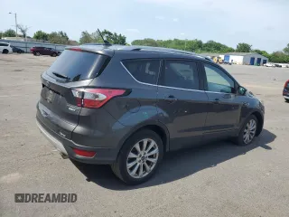 2018 Ford Escape Titanium with VIN 1FMCU9J91JUA47420, listed as a Copart auction lot 61846795 with 77,246 mi miles and Salvage title. Bid and sale history available at DreamBid. Image 3.