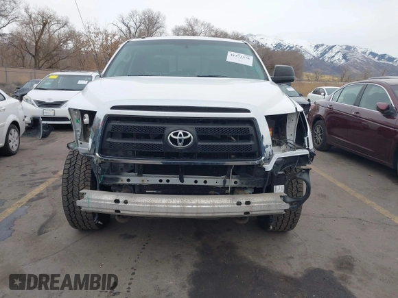 2012 Toyota Tundra z VIN 5TFUM5F11CX039386, wystawiony jako IAAI lot #41472576 z przebiegiem 213 295 mil mil oraz . Historia ofert i sprzedaży dostępna na DreamBid. Obrazek 13.