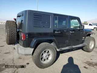 2010 Jeep Wrangler Unlimited Sahara with VIN 1J4BA5H17AL123479, listed as a Copart auction lot 49066315 with 114,419 mi miles and Salvage Title. Bid and sale history available at carsss.com. Image 3.