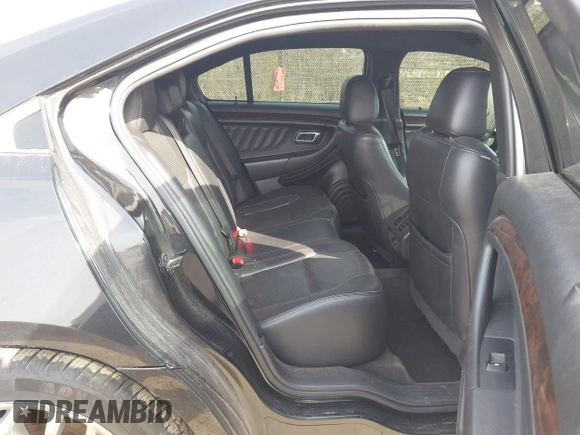 2013 Ford Taurus Limited with VIN 1FAHP2F80DG114817, listed as a IAAI auction lot 41865803 with 207,132 mi miles. Bid and sale history available at carsss.com. Image 8.
