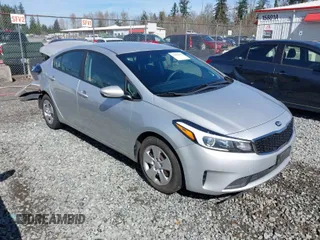 2017 Kia Forte LX with VIN 3KPFK4A7XHE018418, listed as a IAAI auction lot 41874292 with 87,608 mi miles. Bid and sale history available at carsss.com. Image 1.