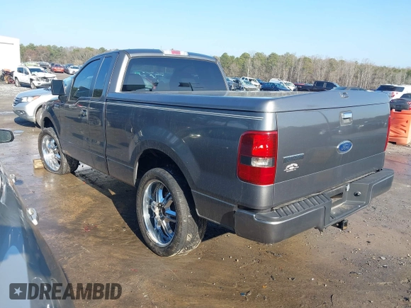 2005 Ford F-150 XL with VIN 1FTRF12295NB93897, listed as a IAAI auction lot 41479312 with 96,731 mi miles. Bid and sale history available at carsss.com. Image 3.
