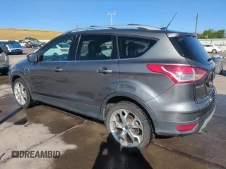 2013 Ford Escape Titanium with VIN 1FMCU0J93DUA78278, listed as a Copart auction lot 63519845 with 141,874 mi miles and Salvage title. Bid and sale history available at DreamBid. Image 2.