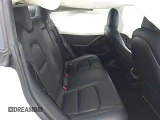2020 Tesla Model 3 Standard Range Plus z VIN 5YJ3E1EA3LF590450, wystawiony jako IAAI lot #42026296 z przebiegiem 68 242 mil mil oraz . Historia ofert i sprzedaży dostępna na DreamBid. Obrazek 8.