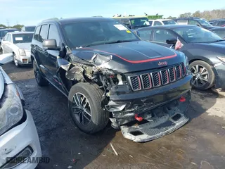 2019 Jeep Grand Cherokee Trailhawk with VIN 1C4RJFLT6KC641507, listed as a IAAI auction lot 41300106 with 87,802 mi miles. Bid and sale history available at carsss.com. Image 1.