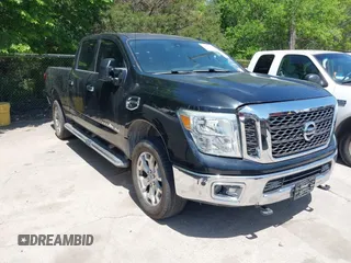 2016 Nissan Titan Platinum Reserve z VIN 1N6BA1F29GN505226, wystawiony jako IAAI lot #42016948 z przebiegiem 176 821 mil mil oraz . Historia ofert i sprzedaży dostępna na DreamBid. Obrazek 1.