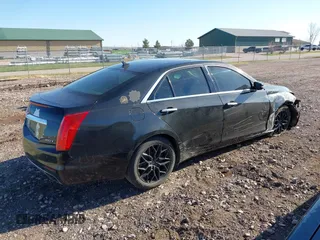 2014 Cadillac CTS Luxury AWD z VIN 1G6AX5SX9E0177017, wystawiony jako IAAI lot #42038429 z przebiegiem 113 656 mil mil oraz . Historia ofert i sprzedaży dostępna na DreamBid. Obrazek 4.